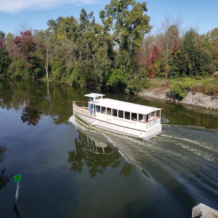a small boat in a body of water