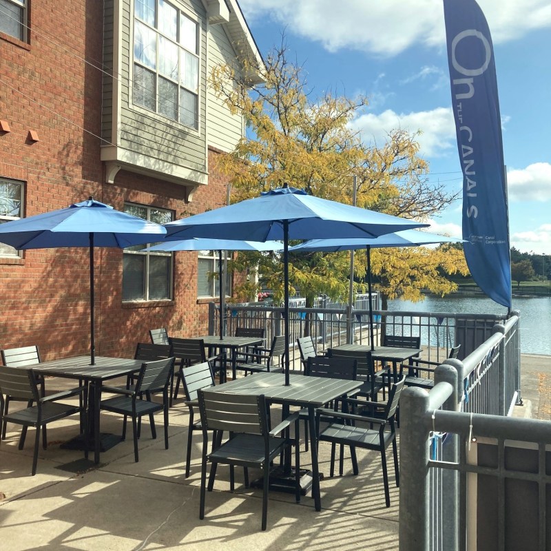 a chair sitting in front of a building