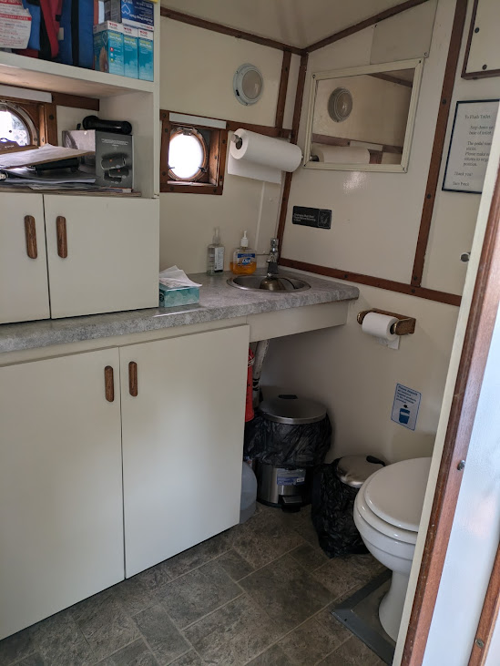 a kitchen with a sink and a refrigerator